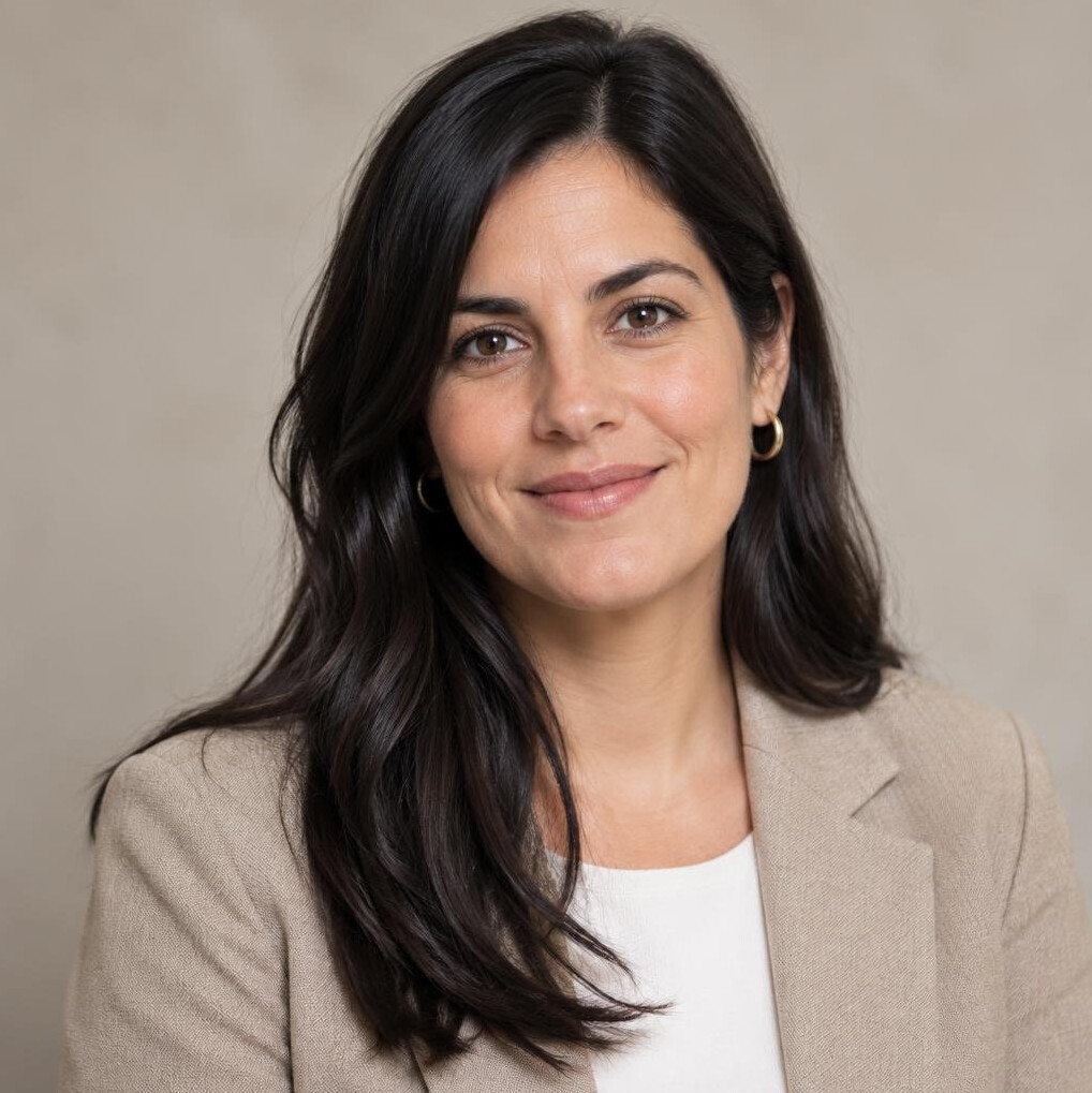 Studio portrait of a Latin American woman writer with dark hair